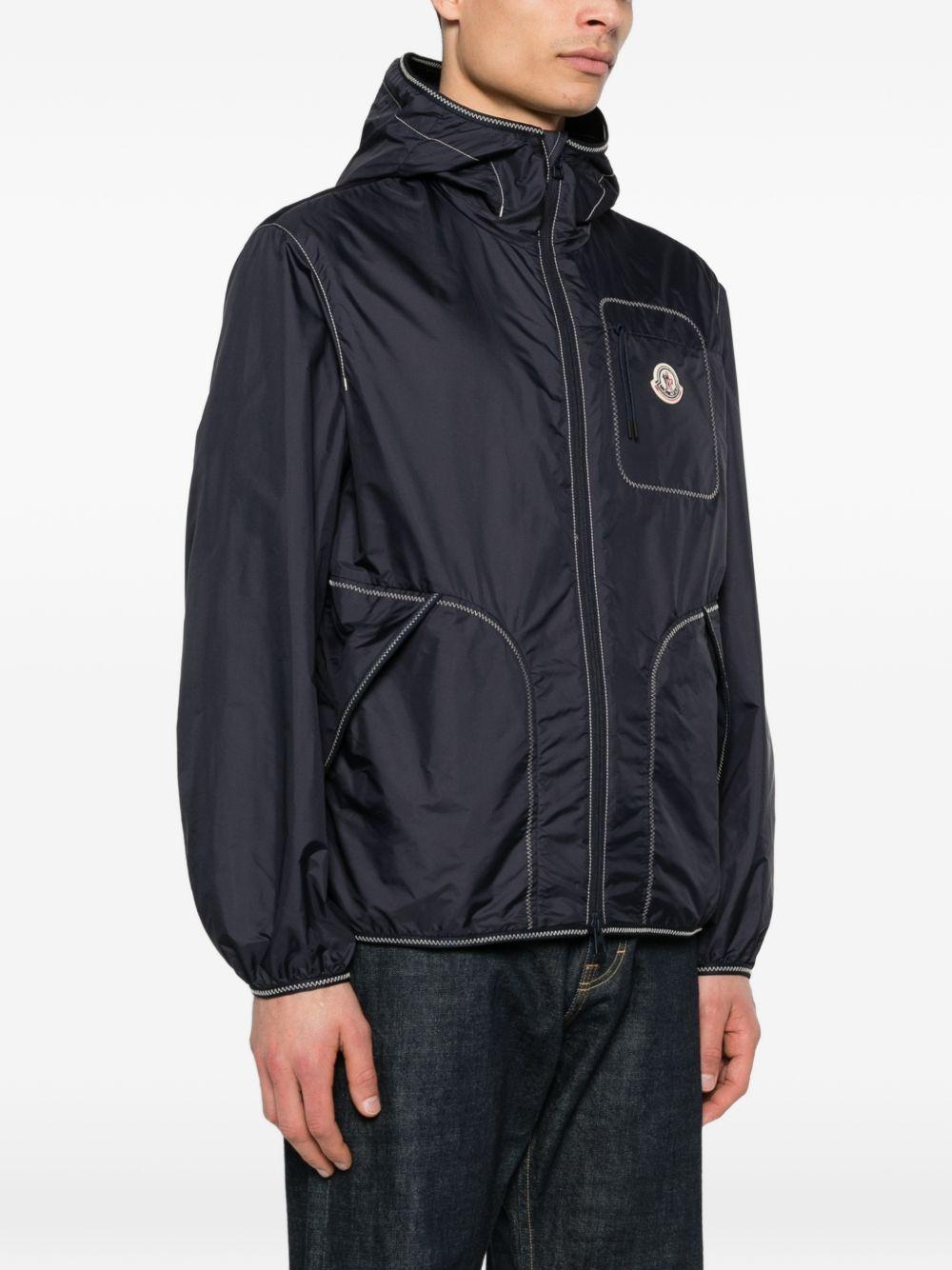 MONCLER Giacca a vento blu con cappuccio e zip 
