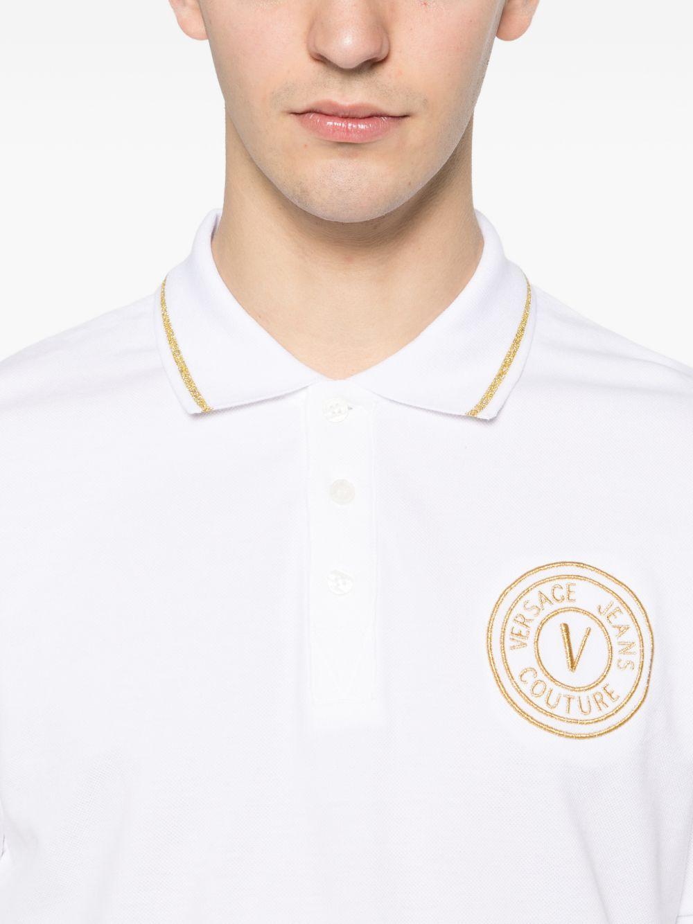 VERSACE JEANS COUTURE Polo in cotone bianco con logo oro 
