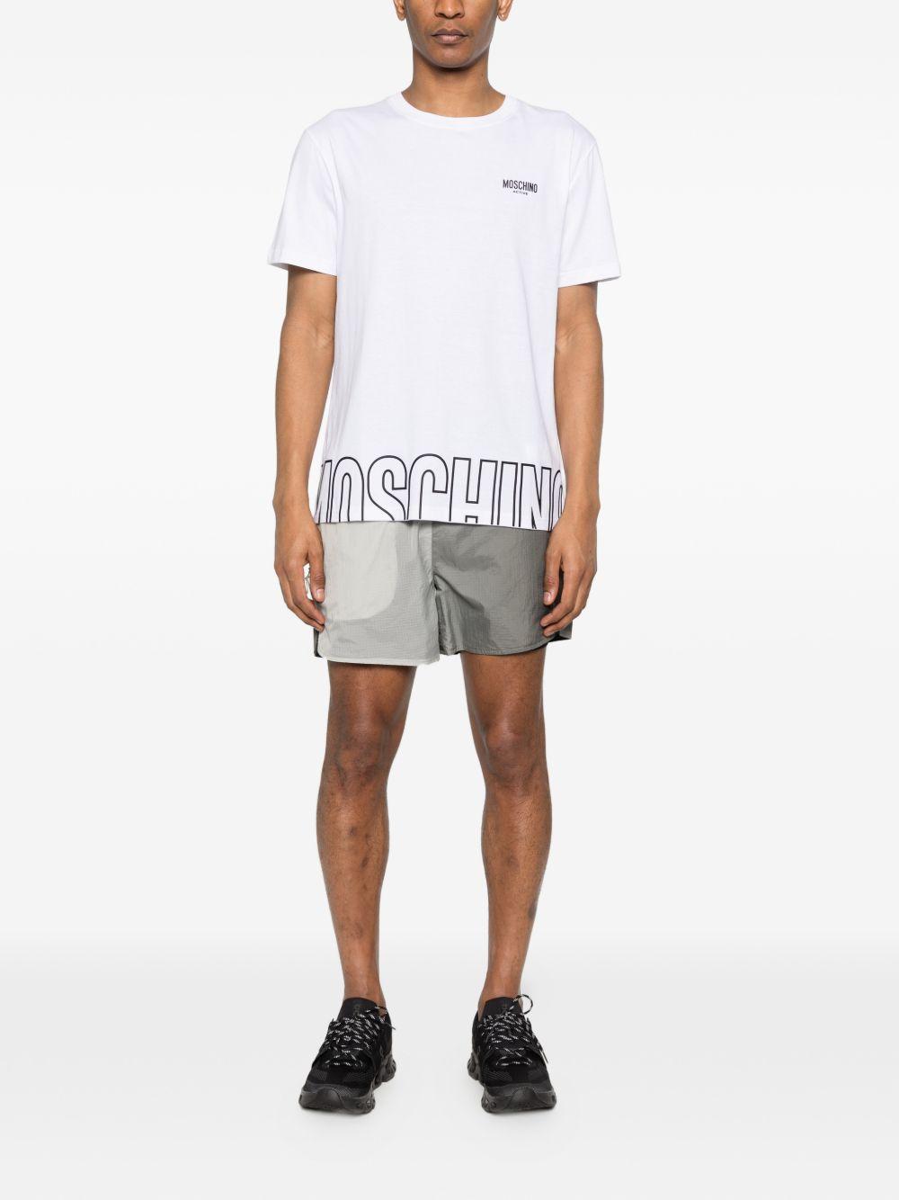 MOSCHINO UNDERWEAR T-shirt bianca con logo e design grafico 