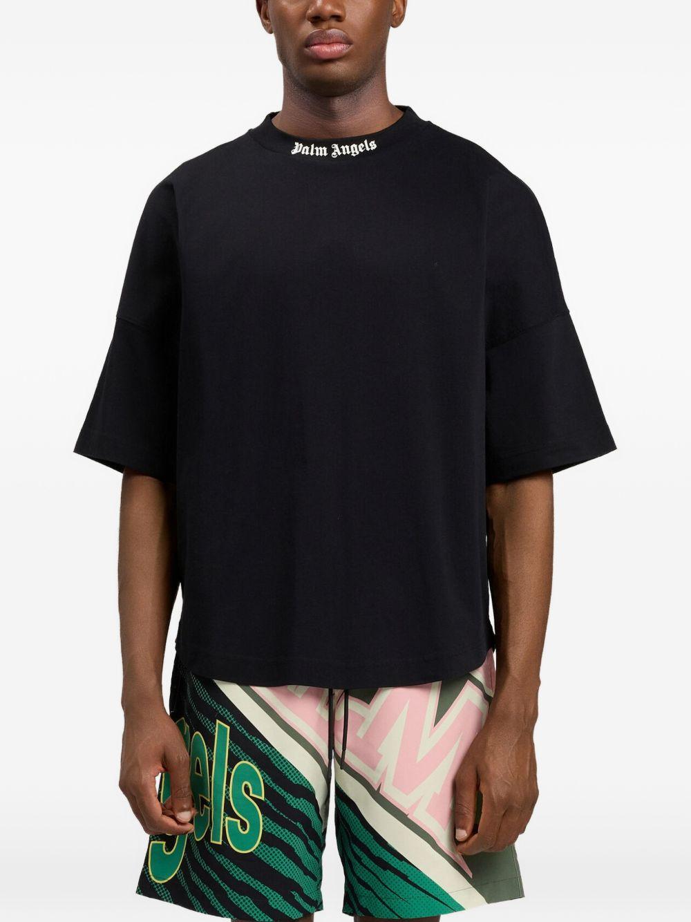 PALM ANGELS T-shirt svasata nera con logo bianco 