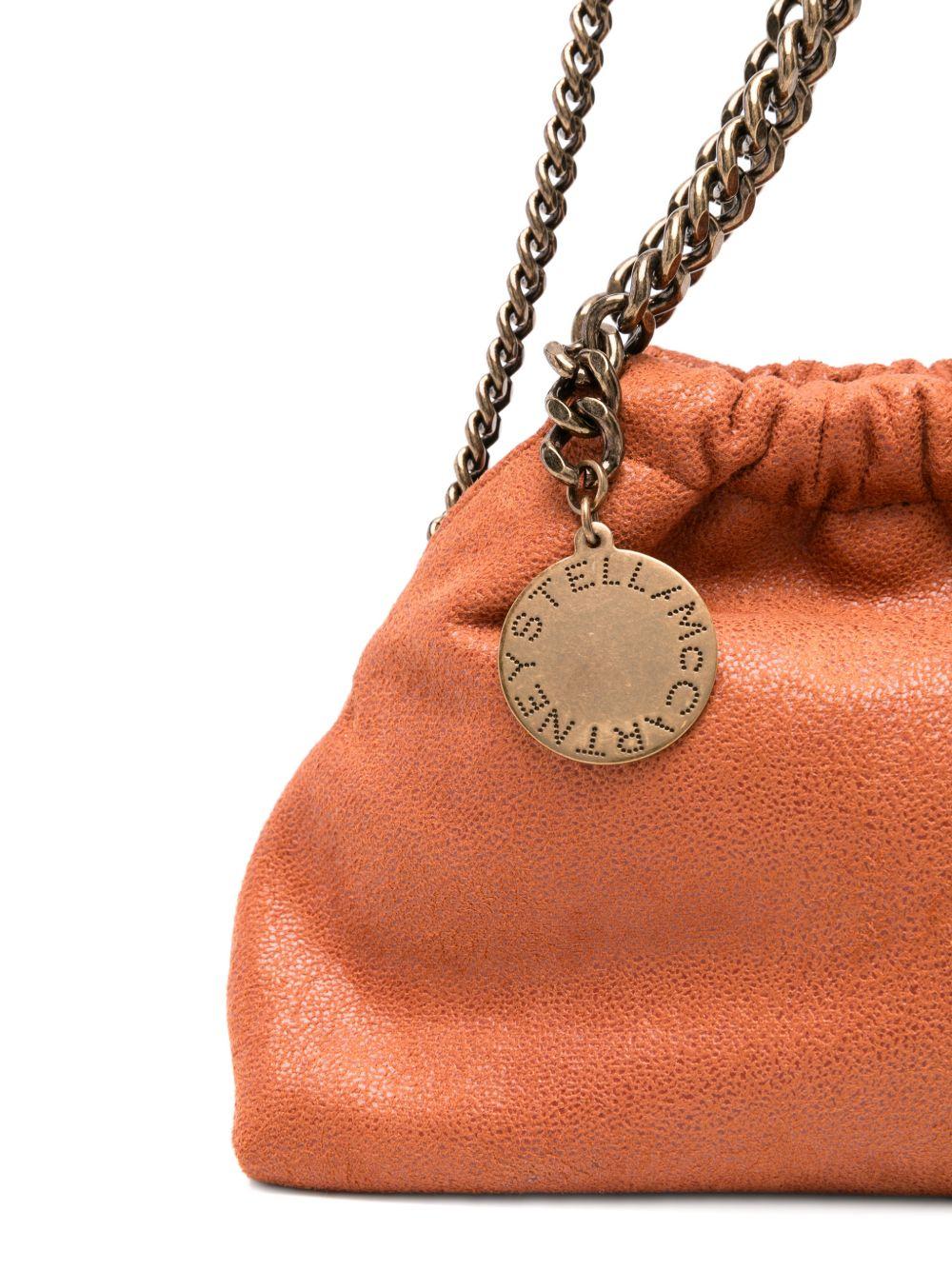 STELLA MCCARTNEY Borsa Falabella Mini Drawstring arancione in materiale vegano 