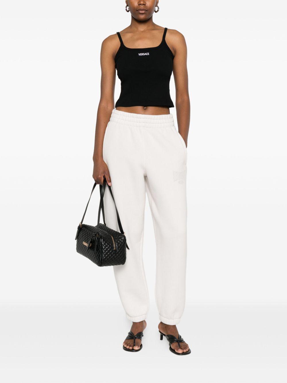 VERSACE Top nero con logo 