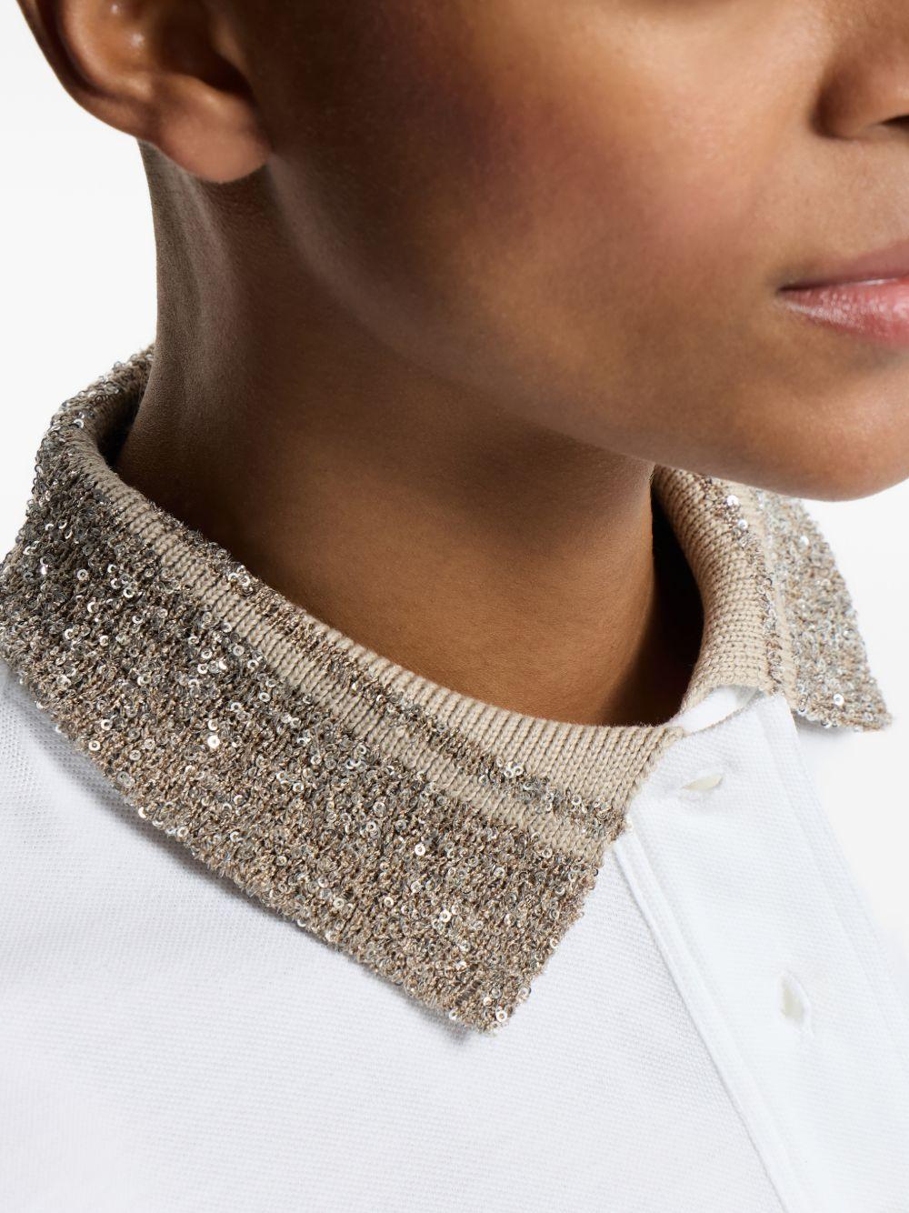 BRUNELLO CUCINELLI Polo in cotone bianco con colletto in maglia e paillettes 