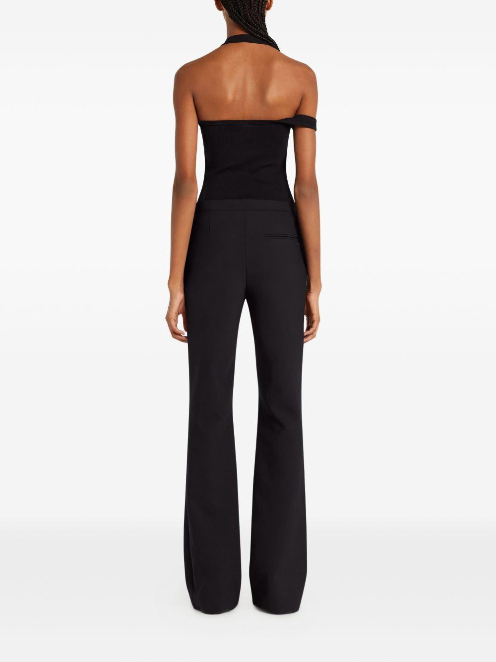 COURREGES Top asimmetrico nero con logo 