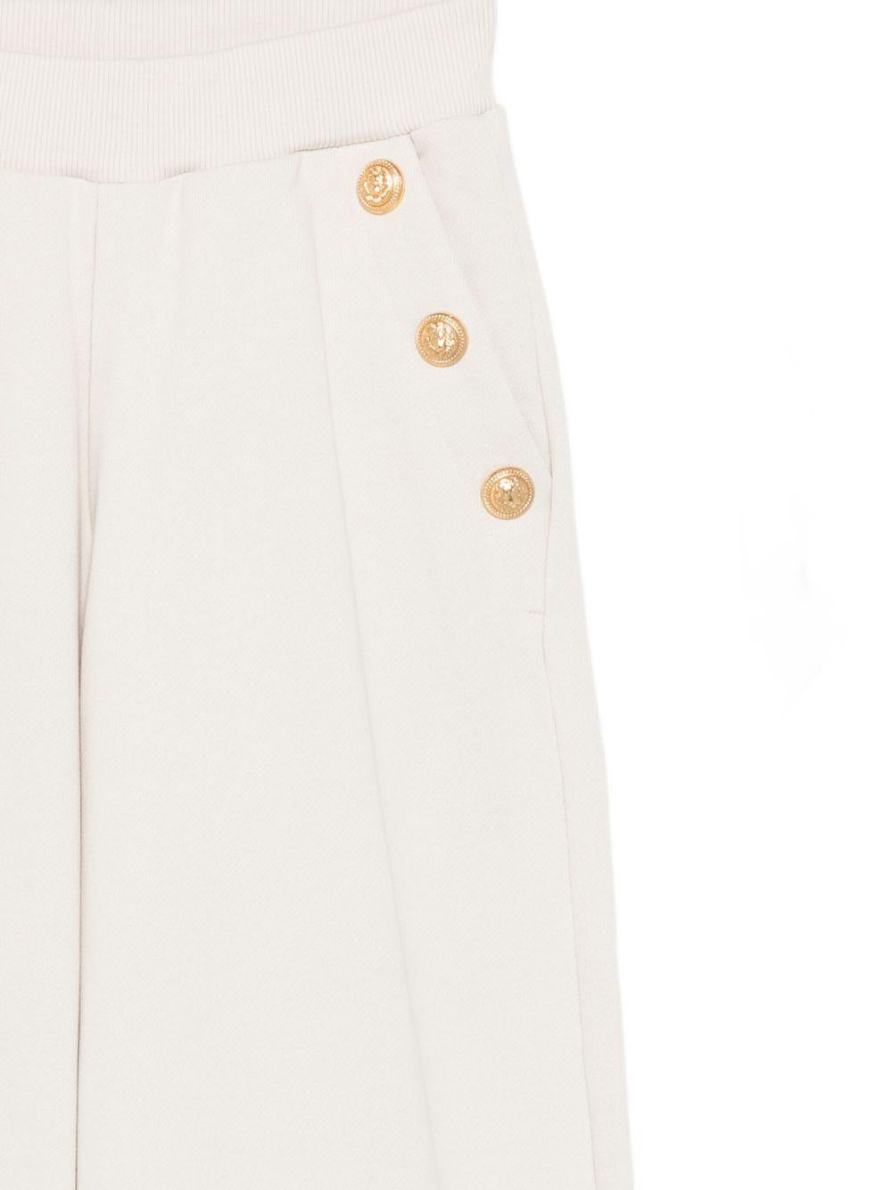 BALMAIN Pantaloni in cotone color crema con bottoni dorati 
