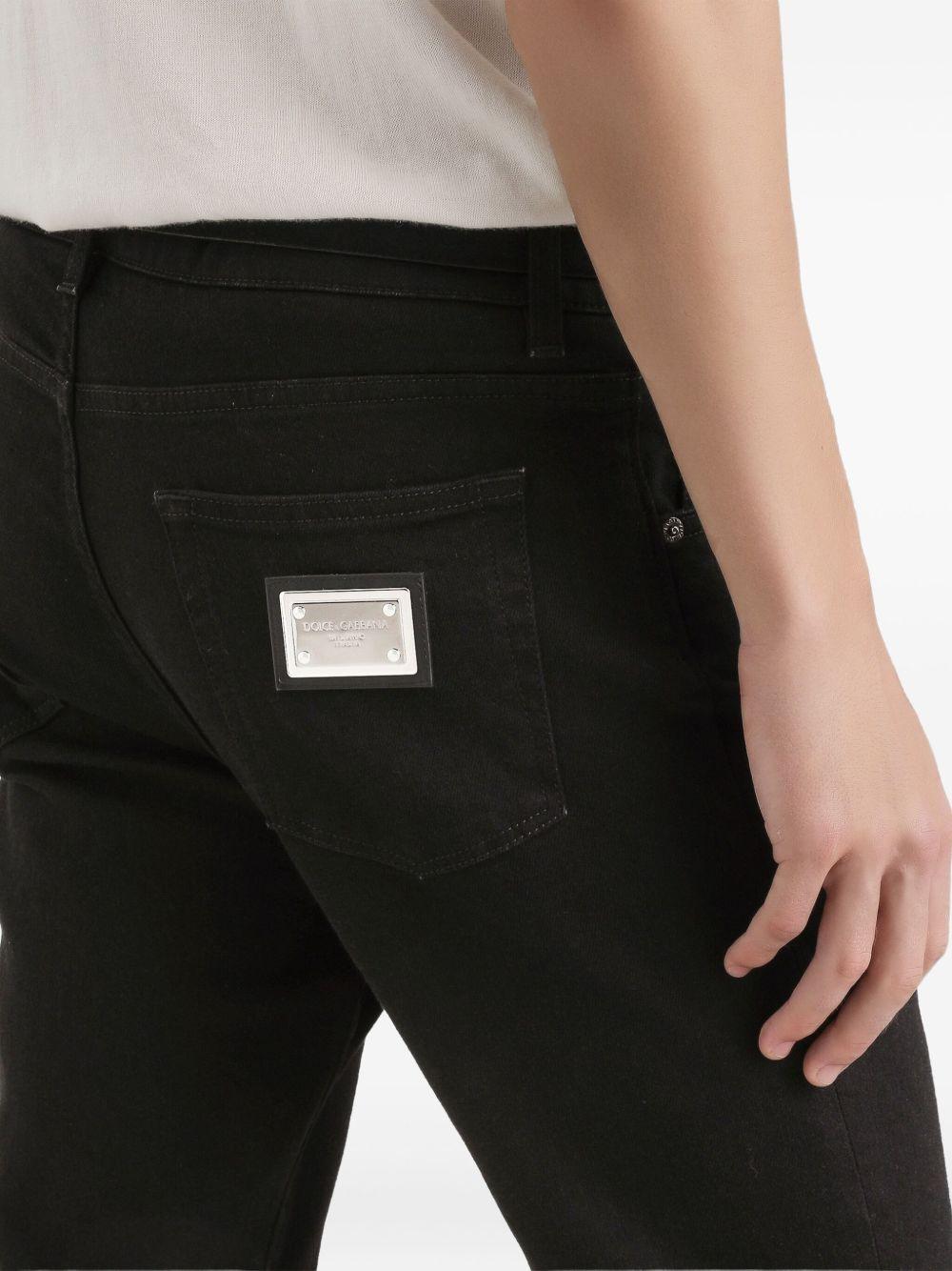 DOLCE e GABBANA Jeans nero con targhetta logo 