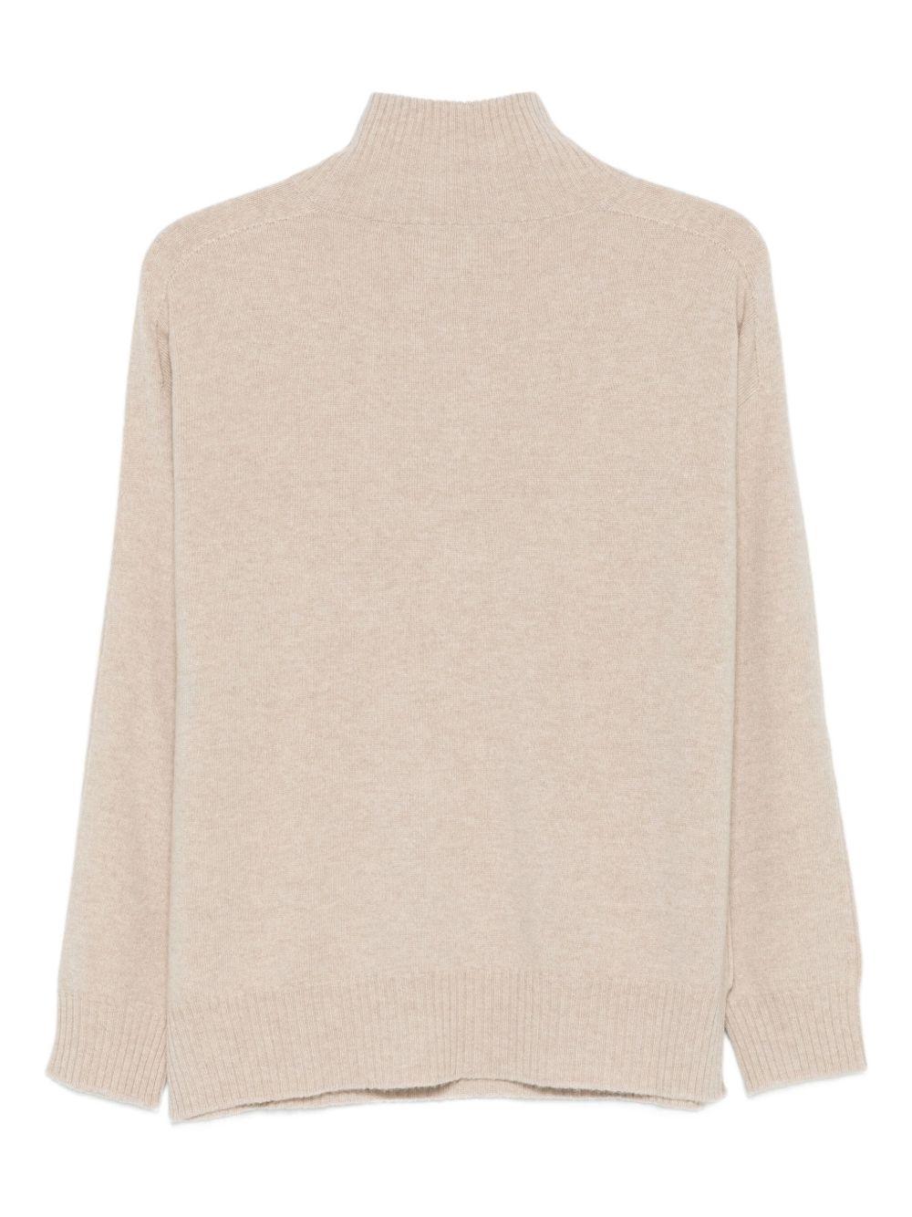 D EXTERIOR Maglia beige con collo alto e zip 