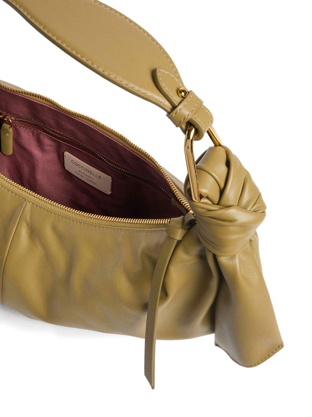 COCCINELLE Borsa a spalla a semiluna verde con nodi 