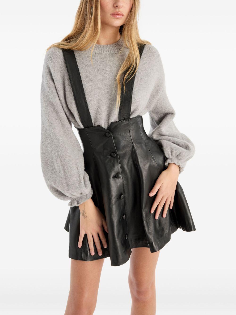 ROTATE Minigonna in pelle con bretelle 