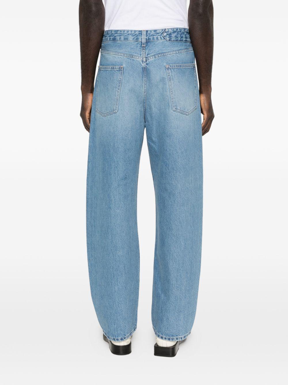 JACQUEMUS Jeans a gamba larga con tasche 