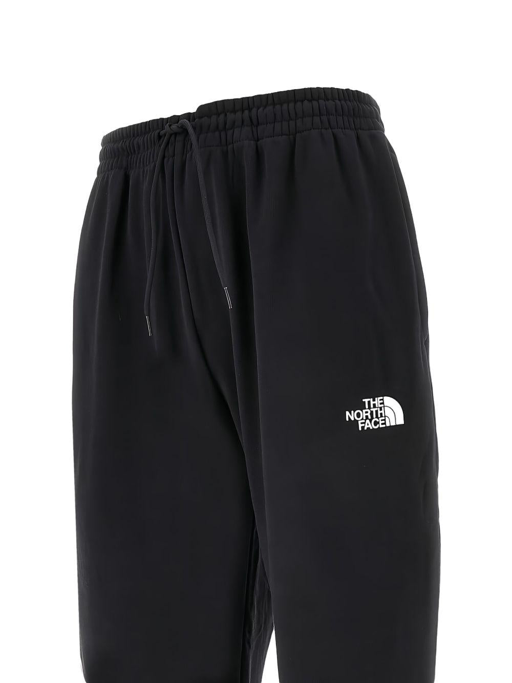 THE NORTH FACE Pantaloni sportivi in cotone nero con logo bianco 
