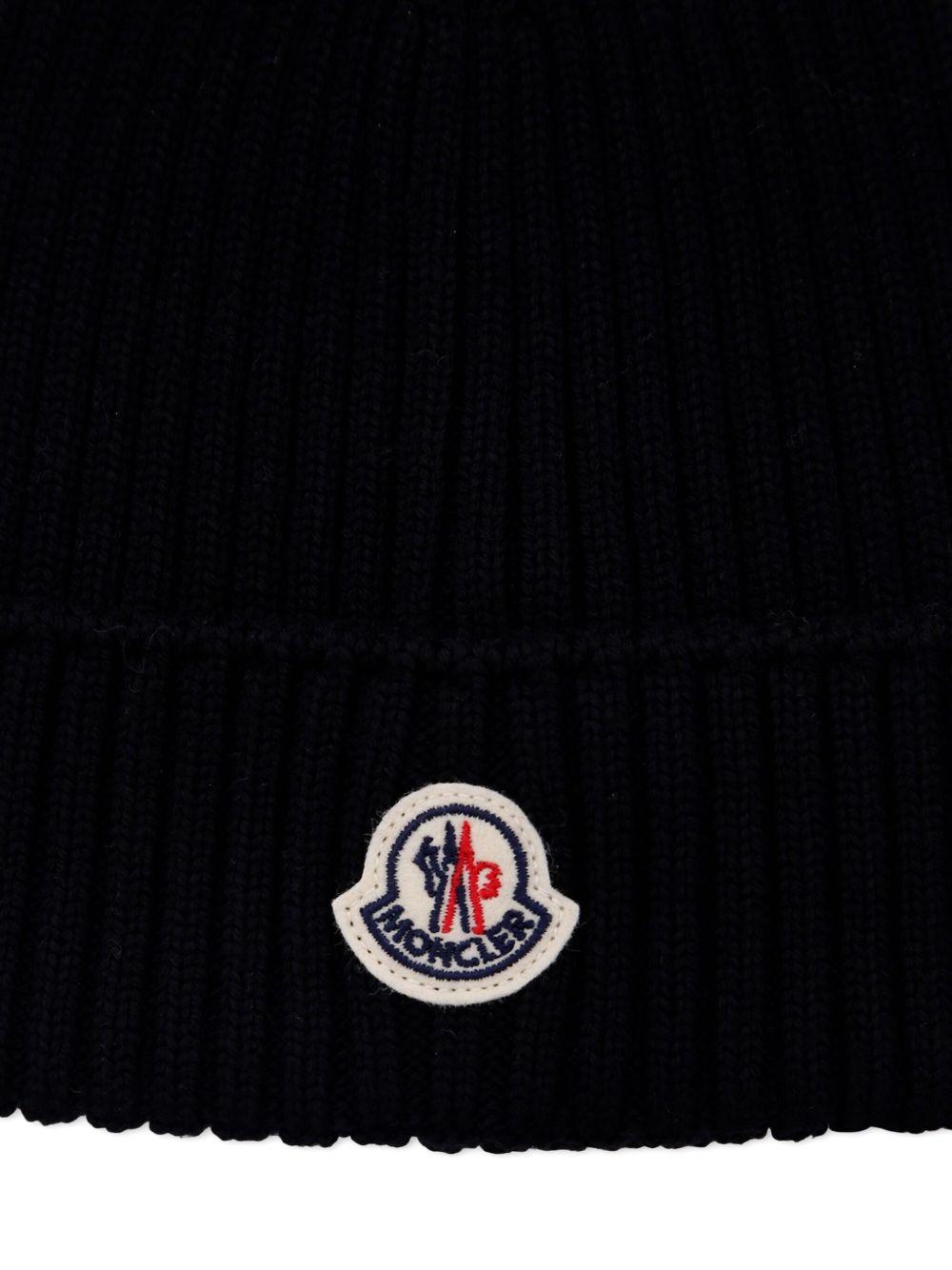 MONCLER Berretto in lana con logo 