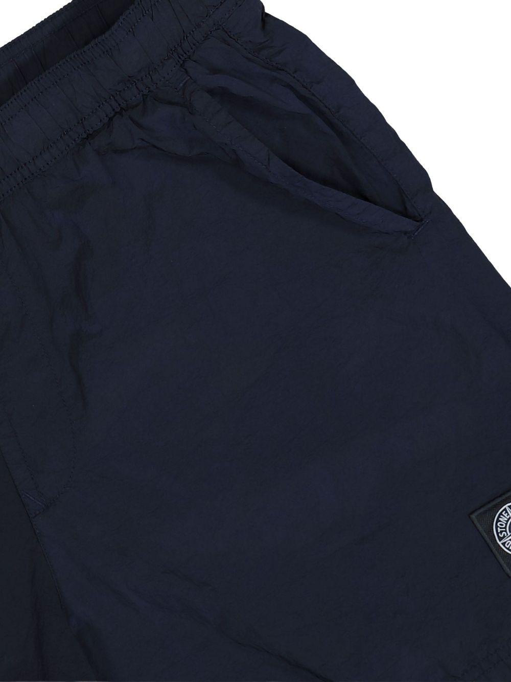 STONE ISLAND Costume mare blu con patch logo 