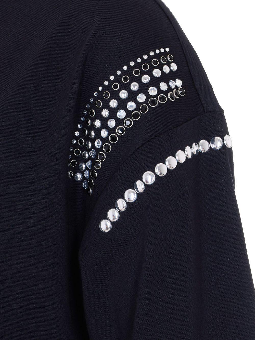 LIUJO T-shirt in cotone nero a maniche corte con decorazioni sulle maniche 