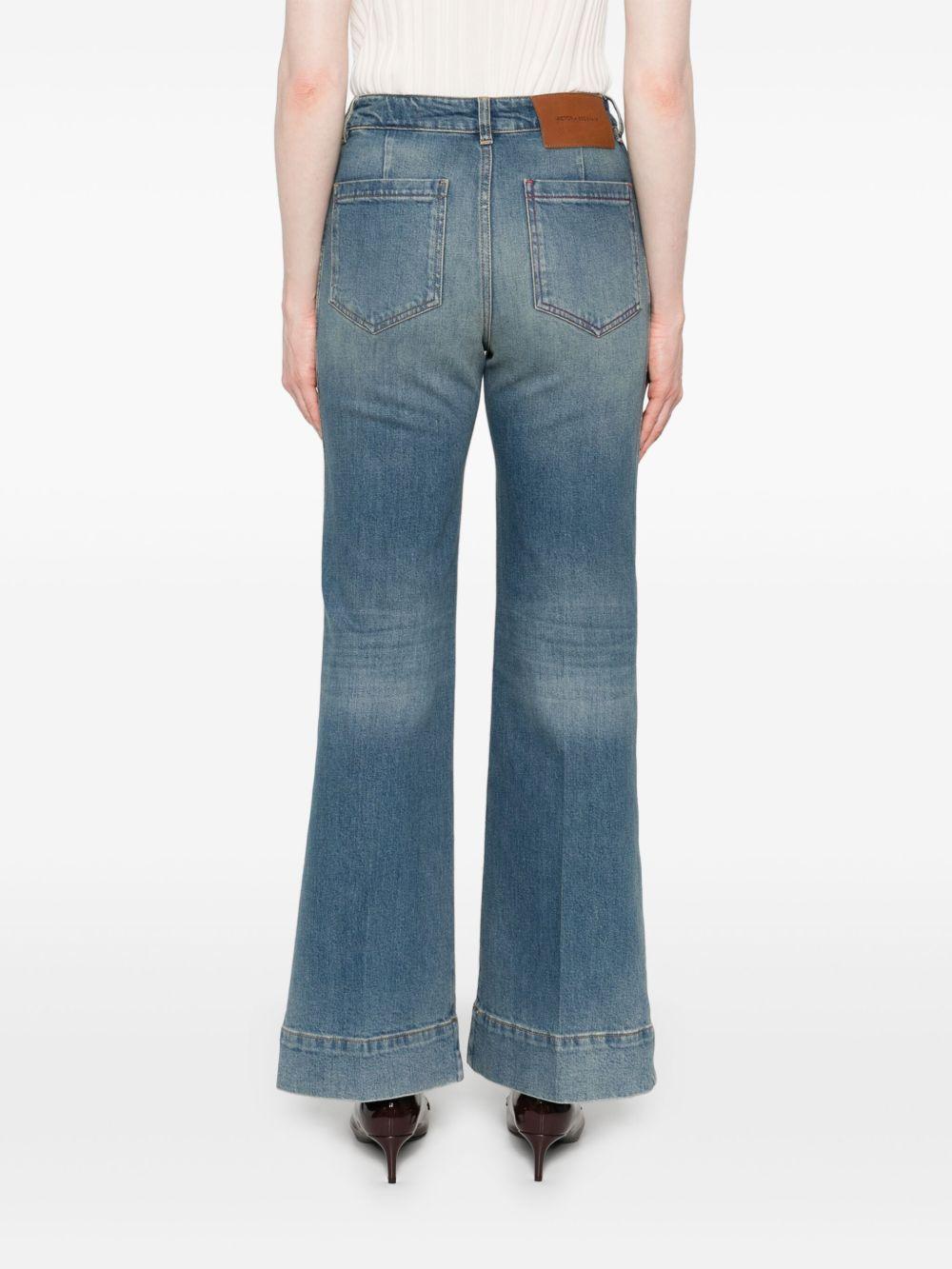 VICTORIA BECKHAM Jeans elasticizzati con applicazione logo 
