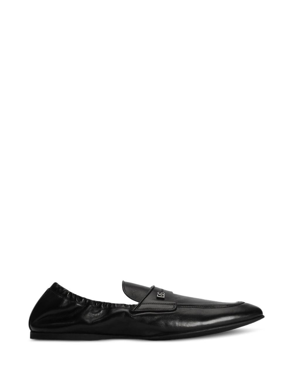 DOLCE e GABBANA Pantofola slip-on in pelle nera con morsetto logo 