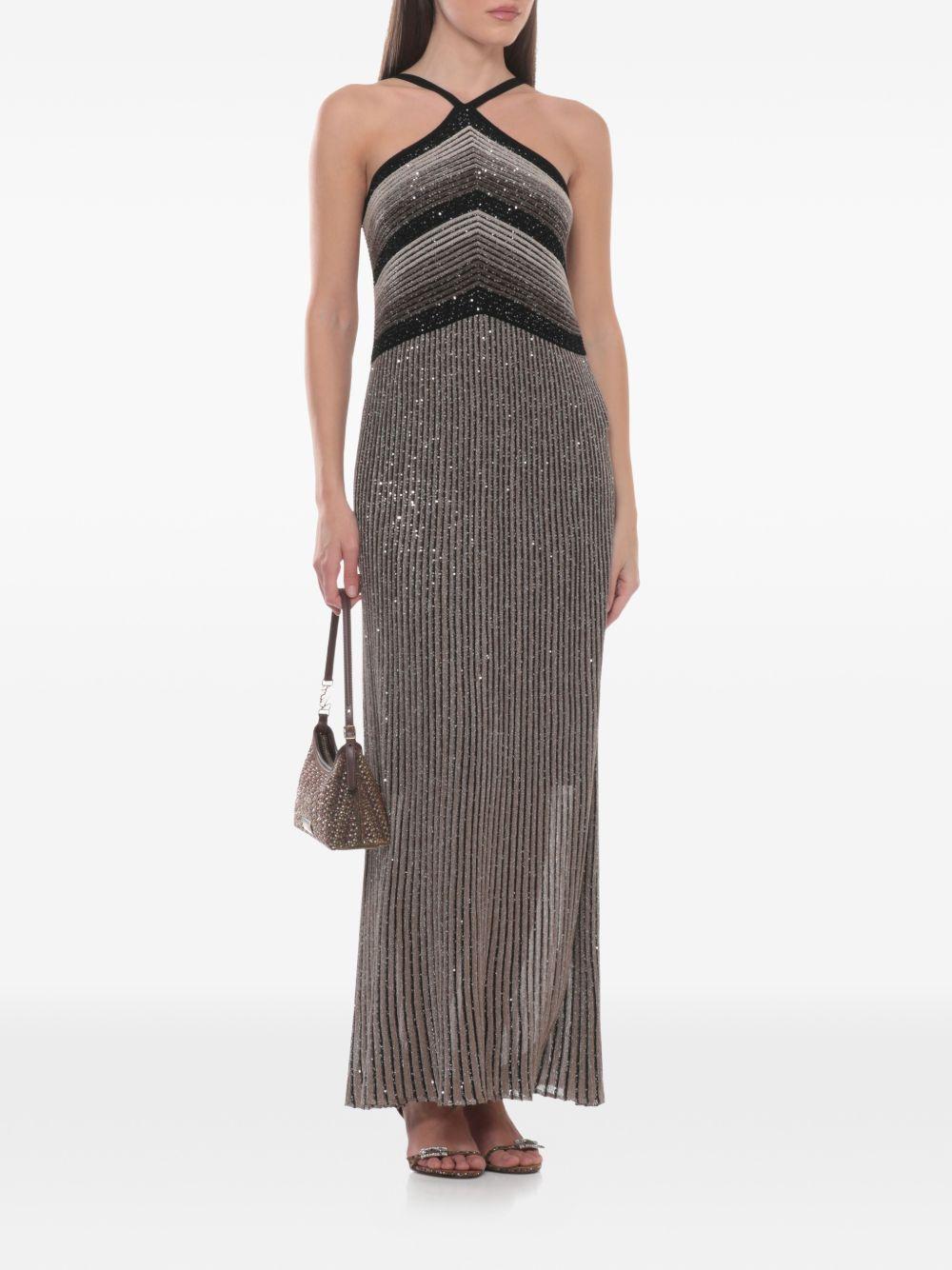 D EXTERIOR Abito lungo grigio con strass 