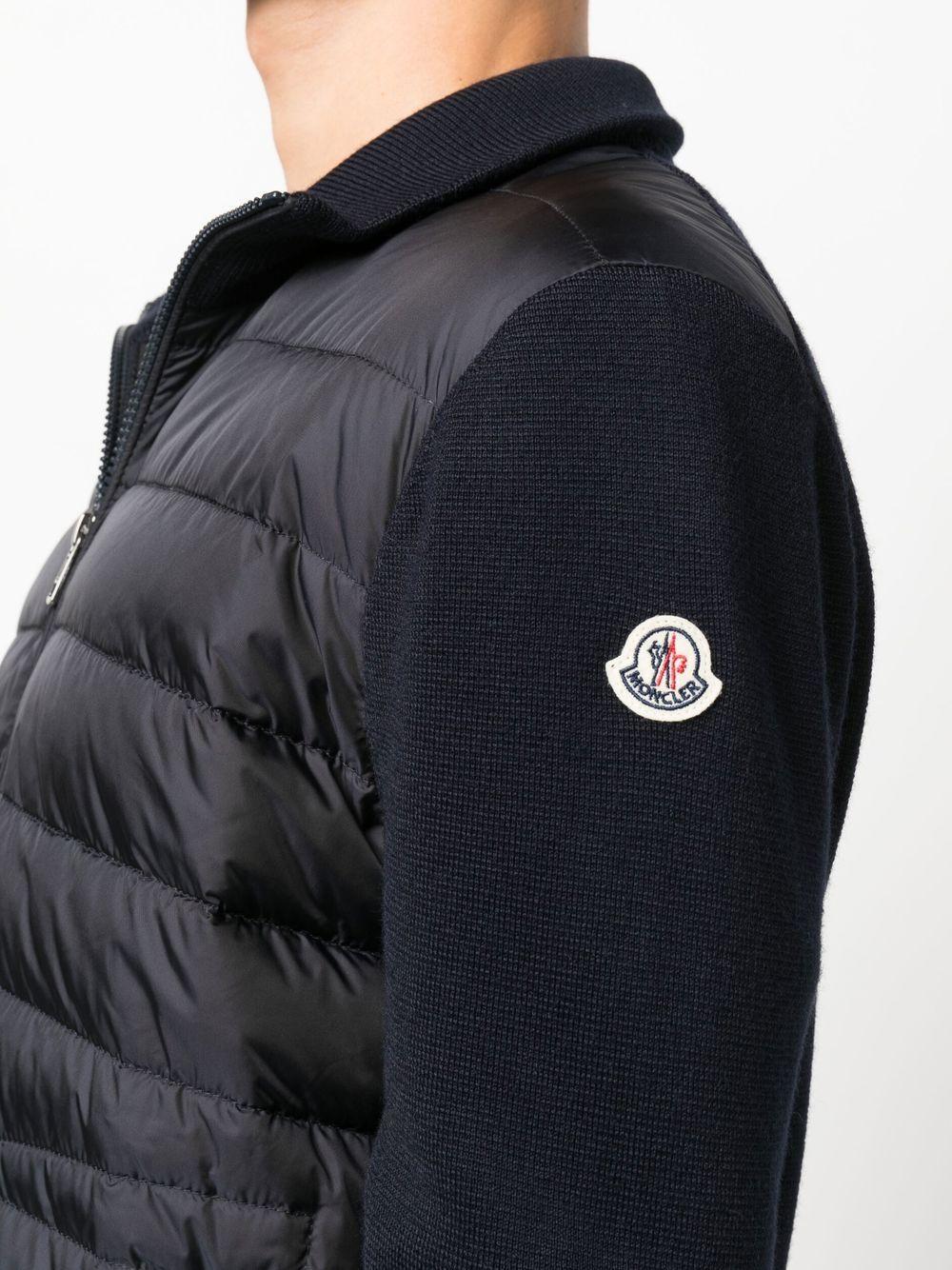 MONCLER Piumino blu navy con maniche di lana 