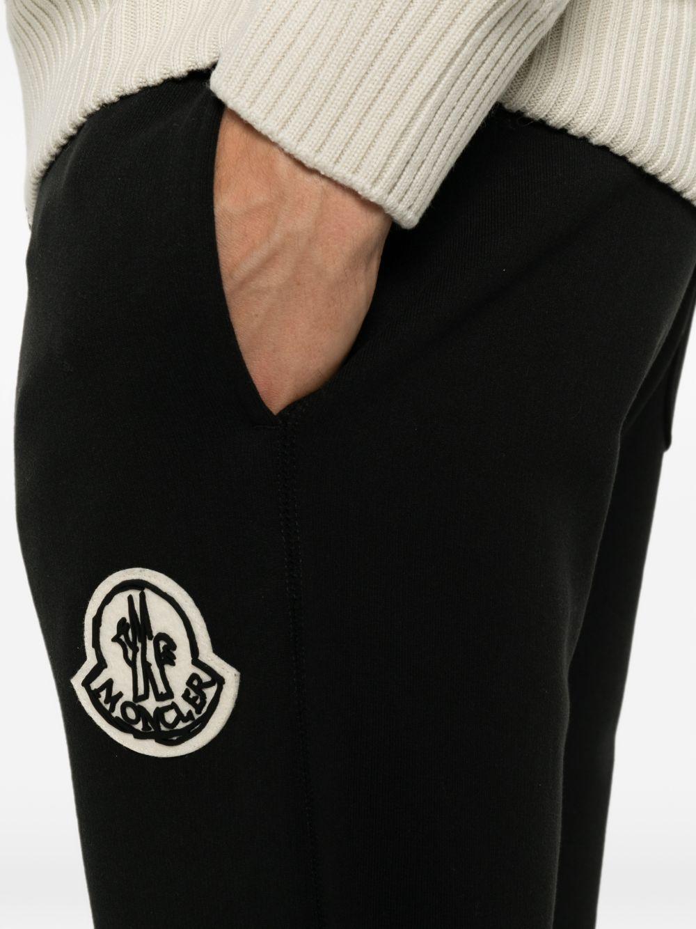 MONCLER Pantaloni sportivi neri in cotone con patch logo 