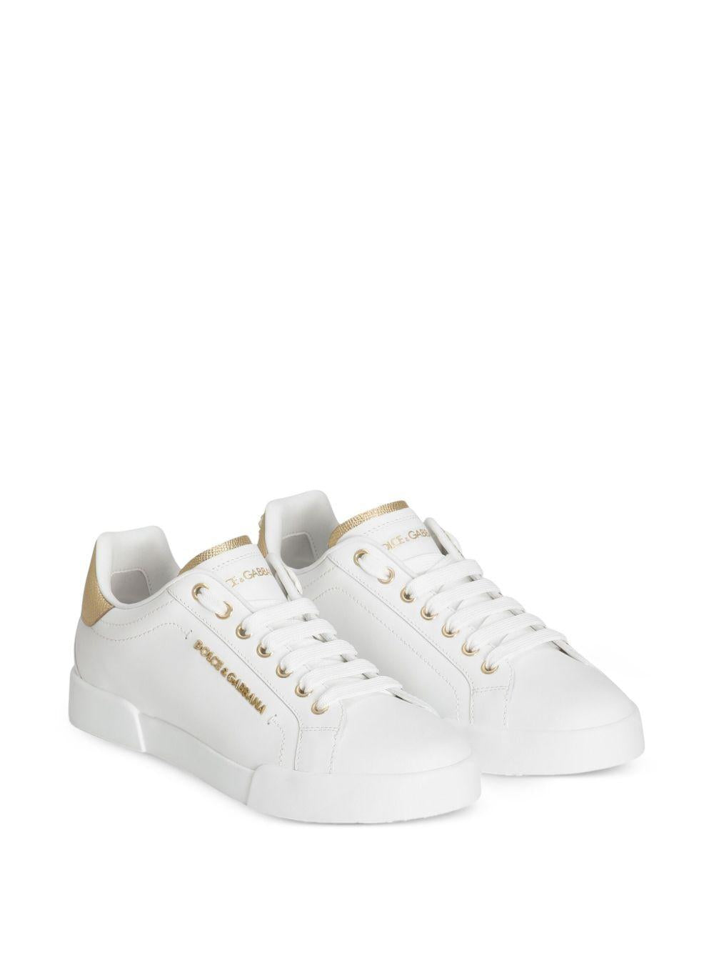 DOLCE e GABBANA Sneakers Portofino in pelle bianca e oro 