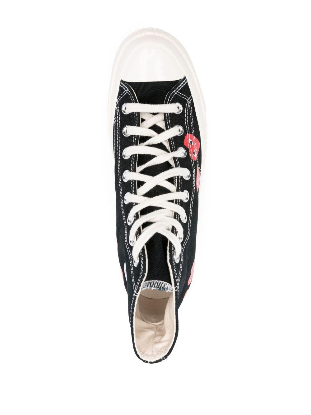 COMME DES GARCONS PLAY Sneakers con cuori 