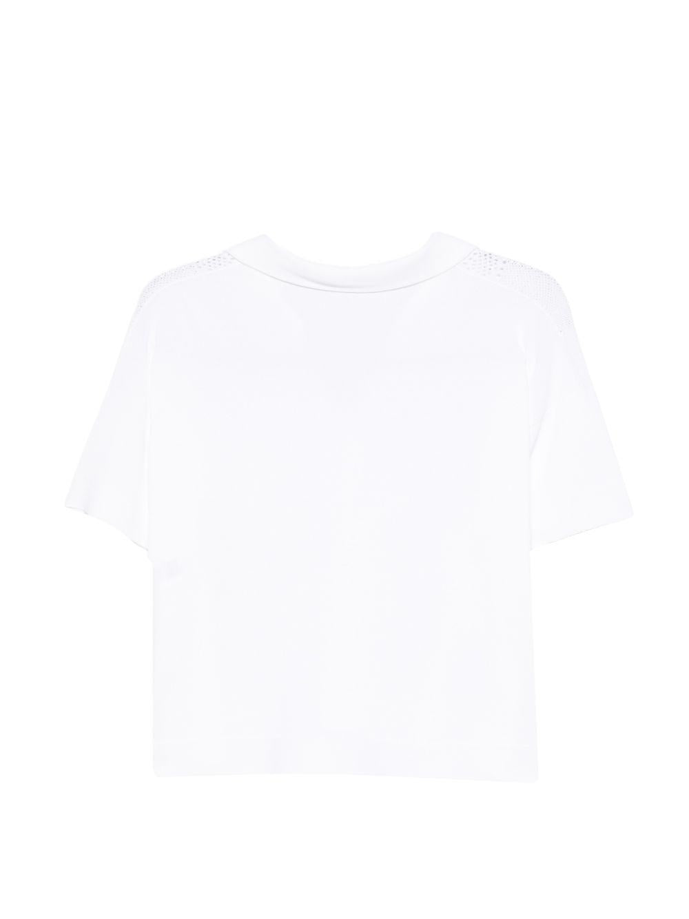 D EXTERIOR Polo in maglia bianca 