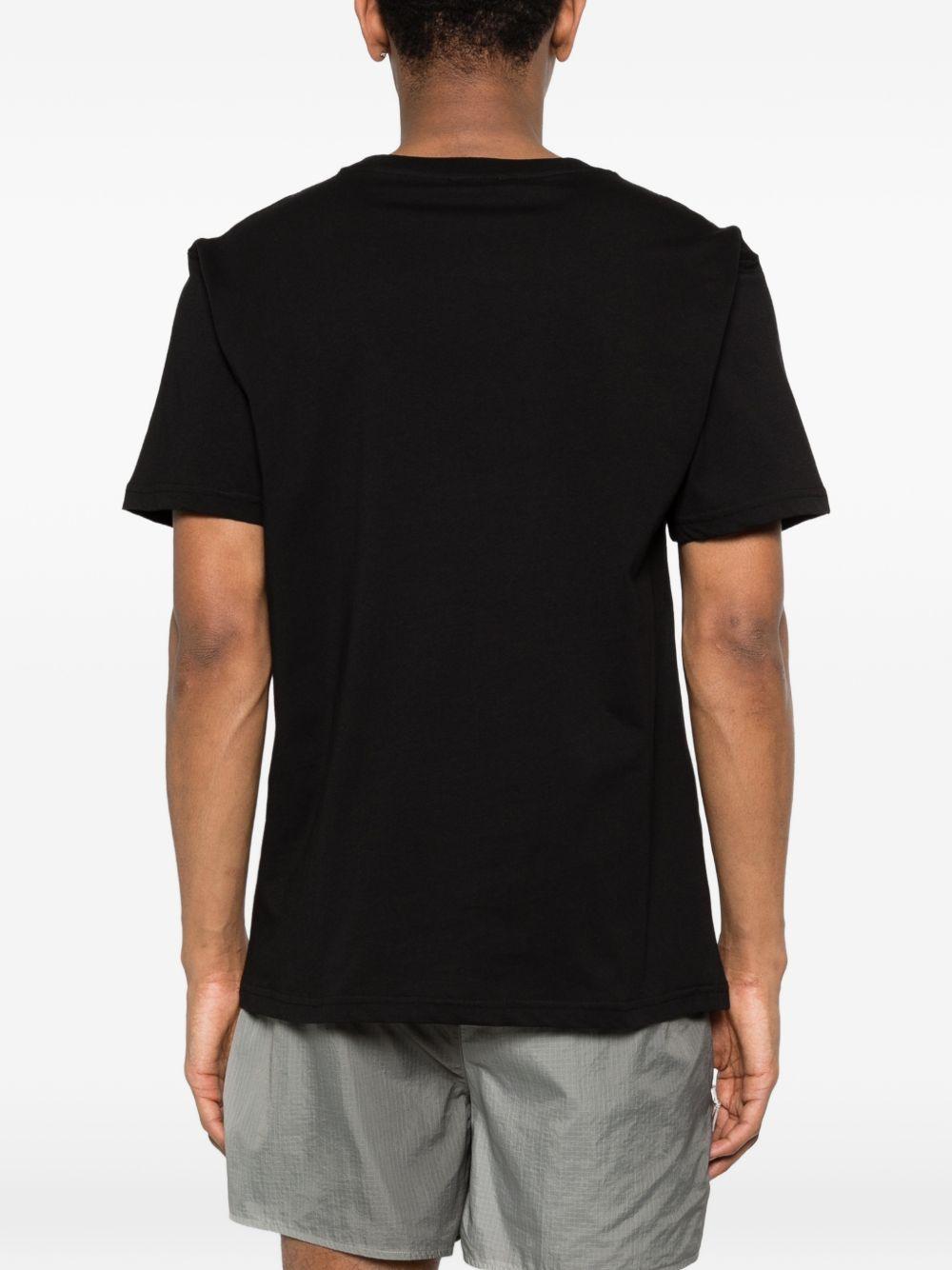 MOSCHINO UNDERWEAR T-shirt nera con logo e design grafico 