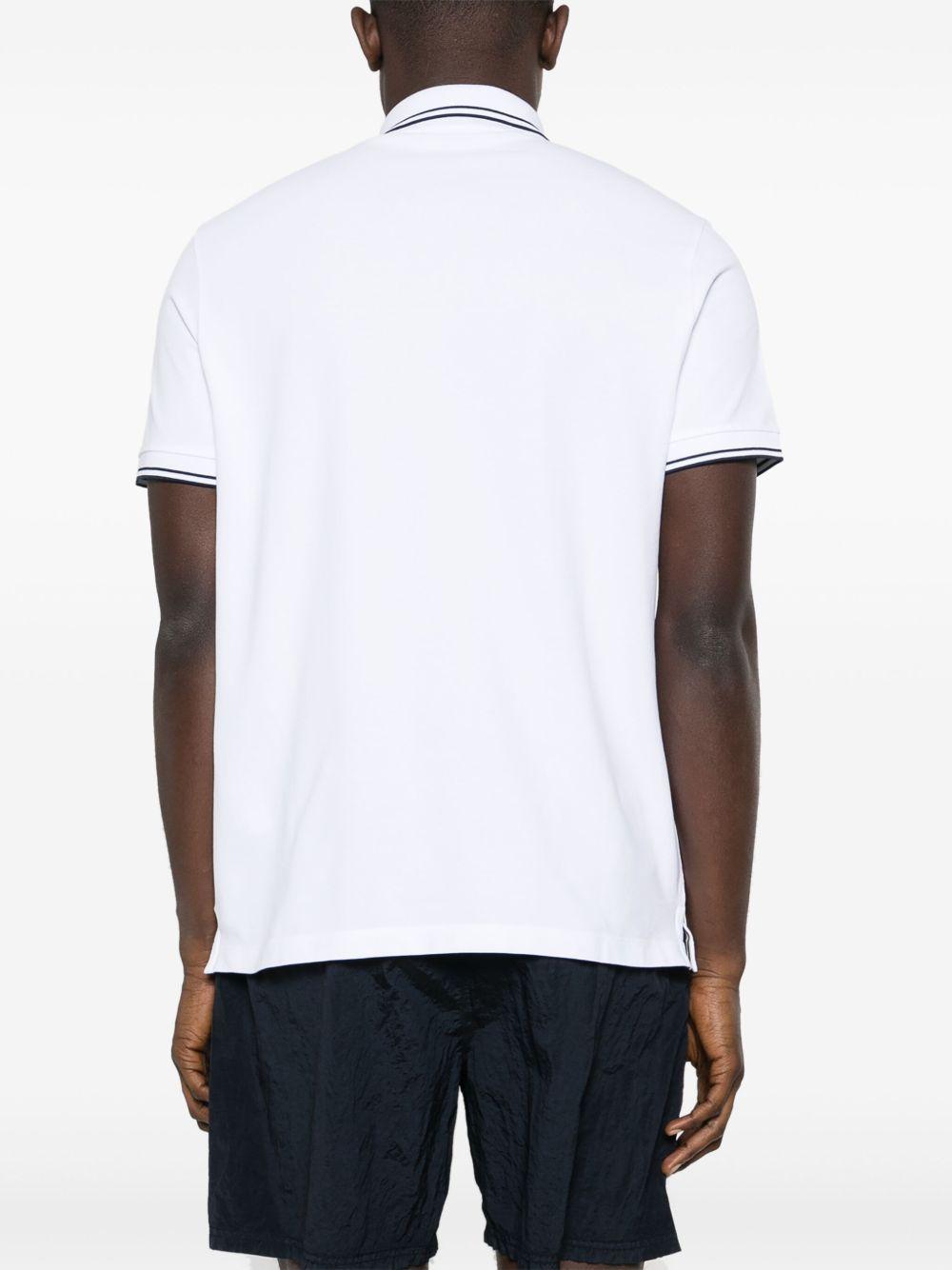 STONE ISLAND Polo in cotone bianco con logo 