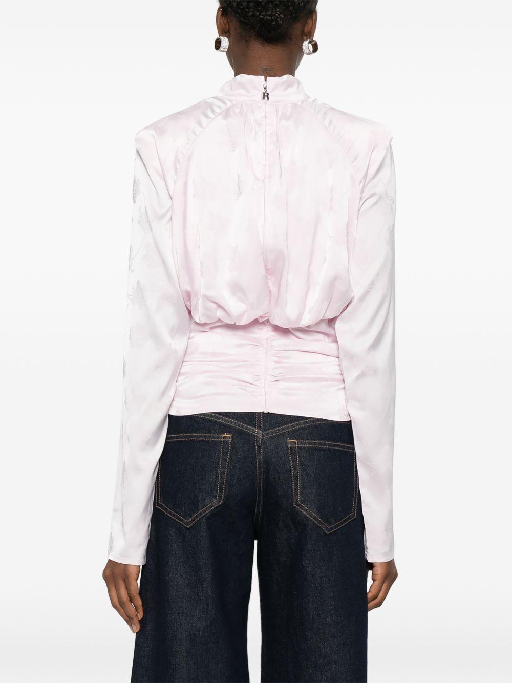 ROTATE Top rosa cipria con grafica floreale all-over 