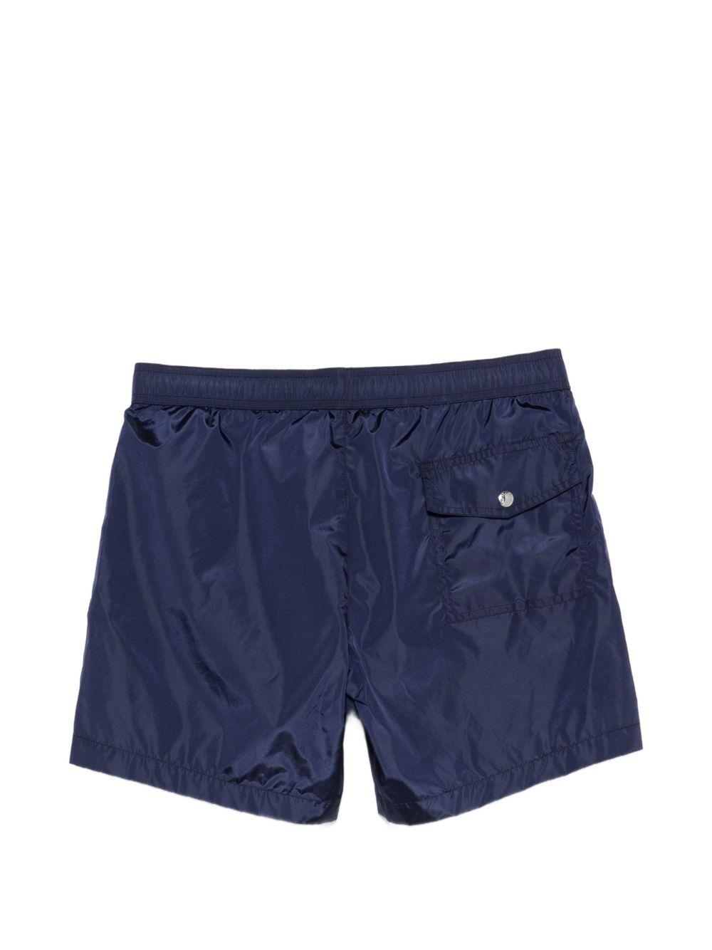 MONCLER Costume blu con logo 