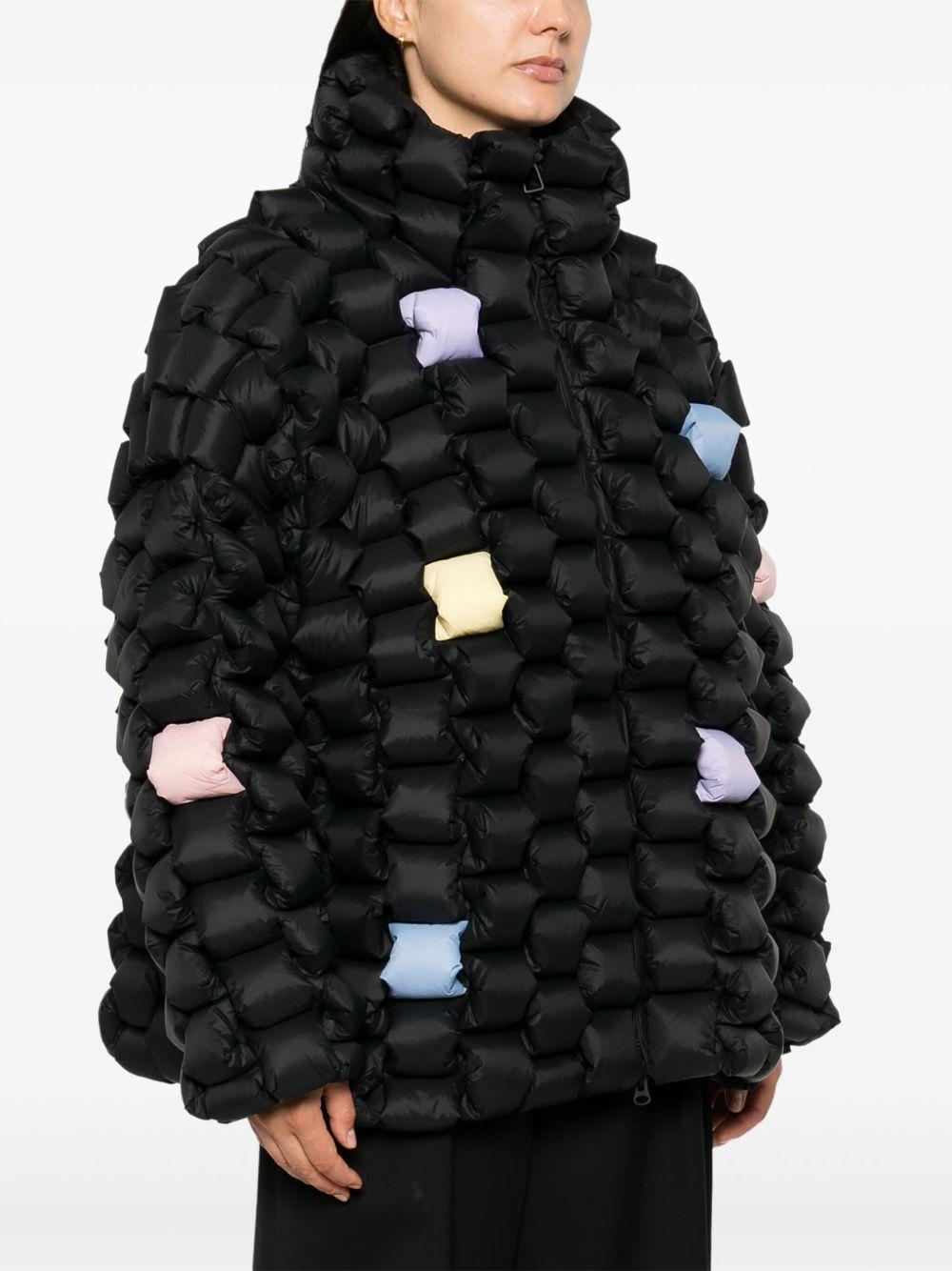 RAXXY Piumino nero con design imbottito a intreccio 3D 