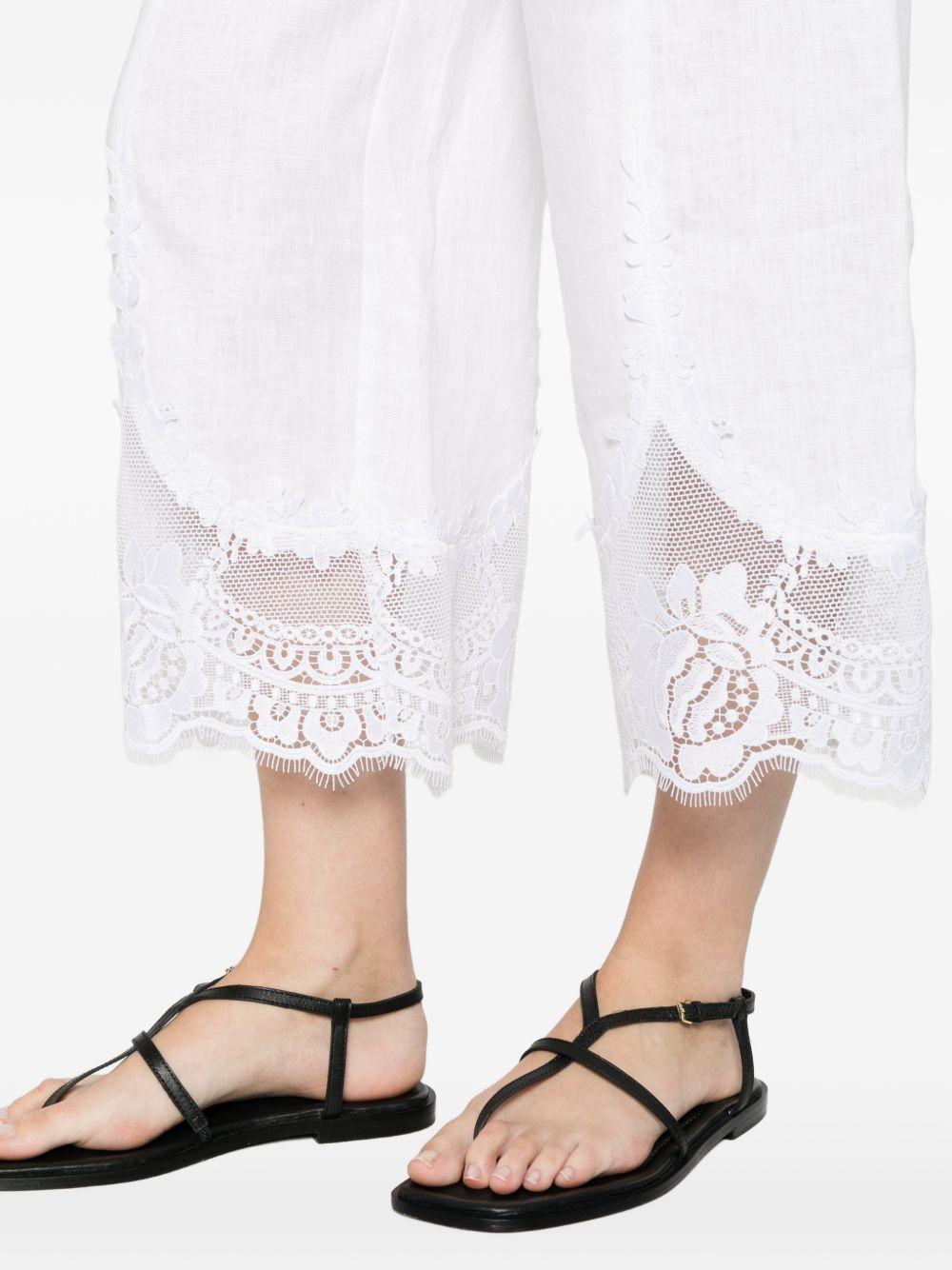 TWINSET Pantaloni bianchi di lino con pizzo sul fondo 