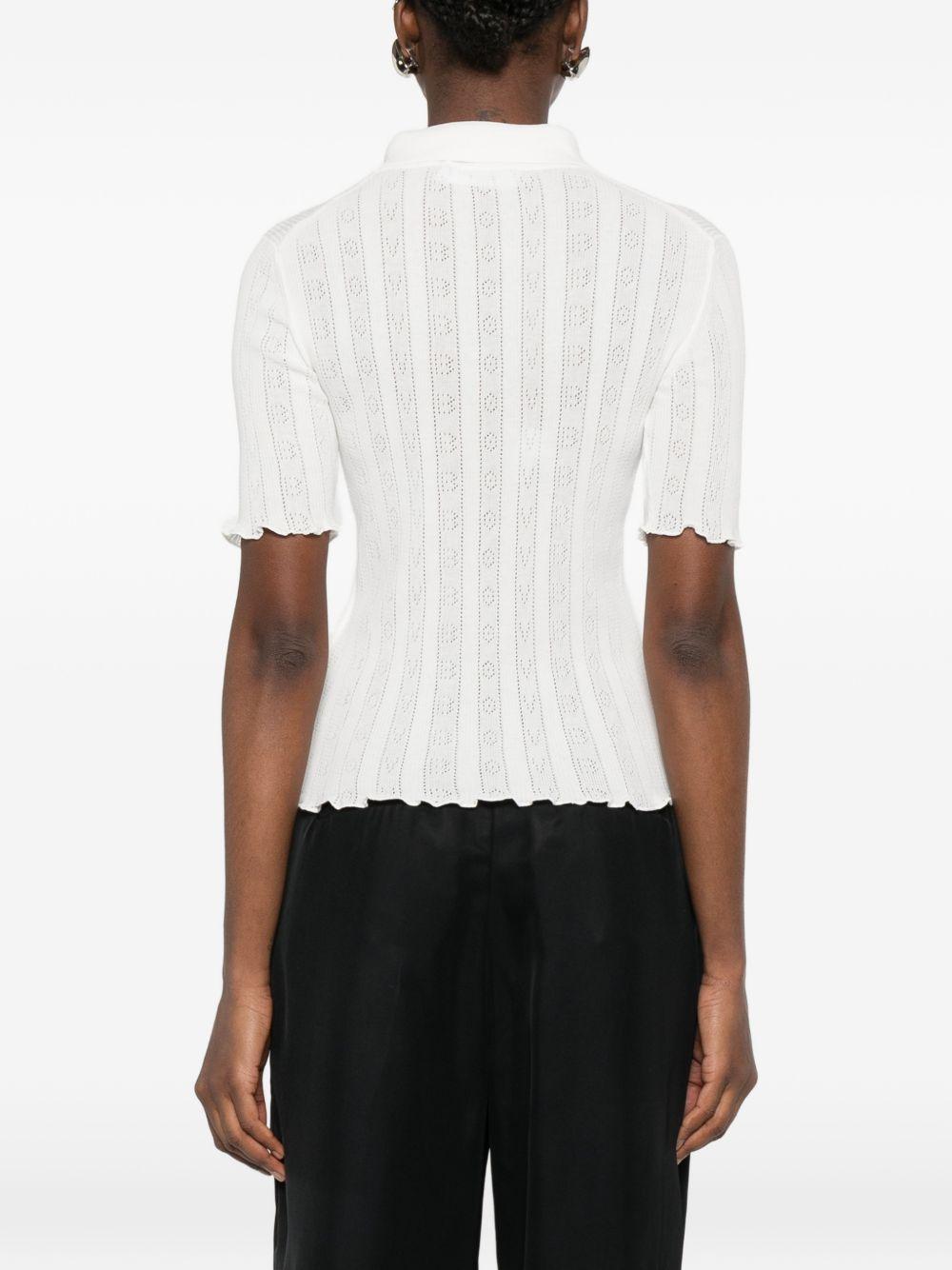 VICTORIA BECKHAM Polo in cotone bianco traforata 