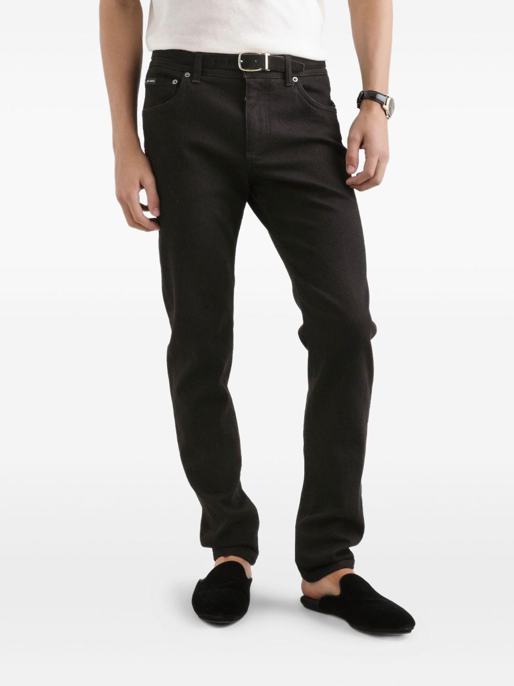 DOLCE e GABBANA Jeans nero con targhetta logo 