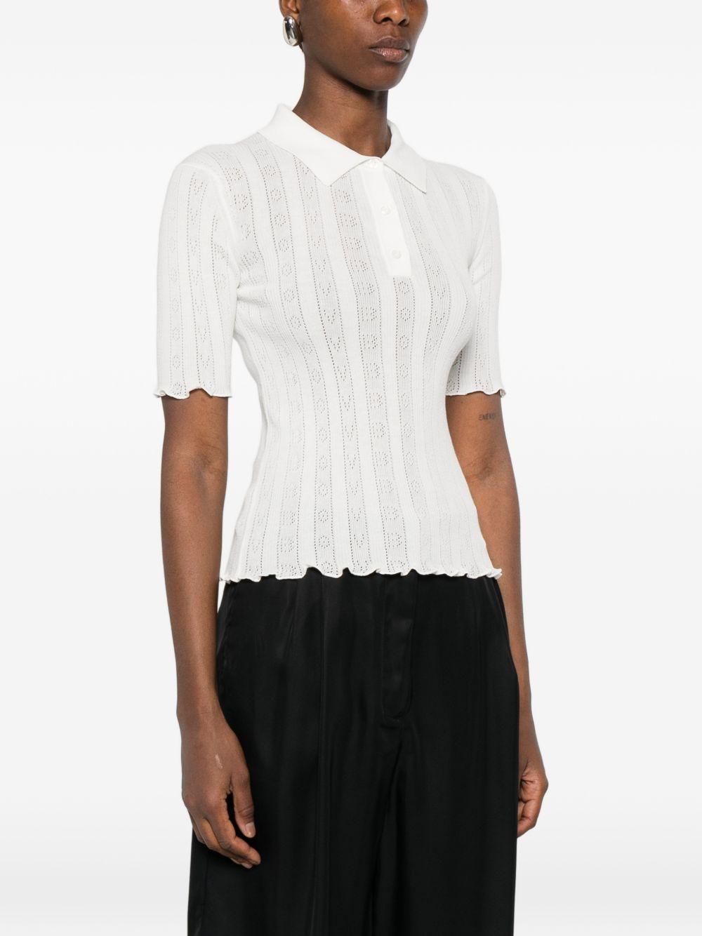 VICTORIA BECKHAM Polo in cotone bianco traforata 