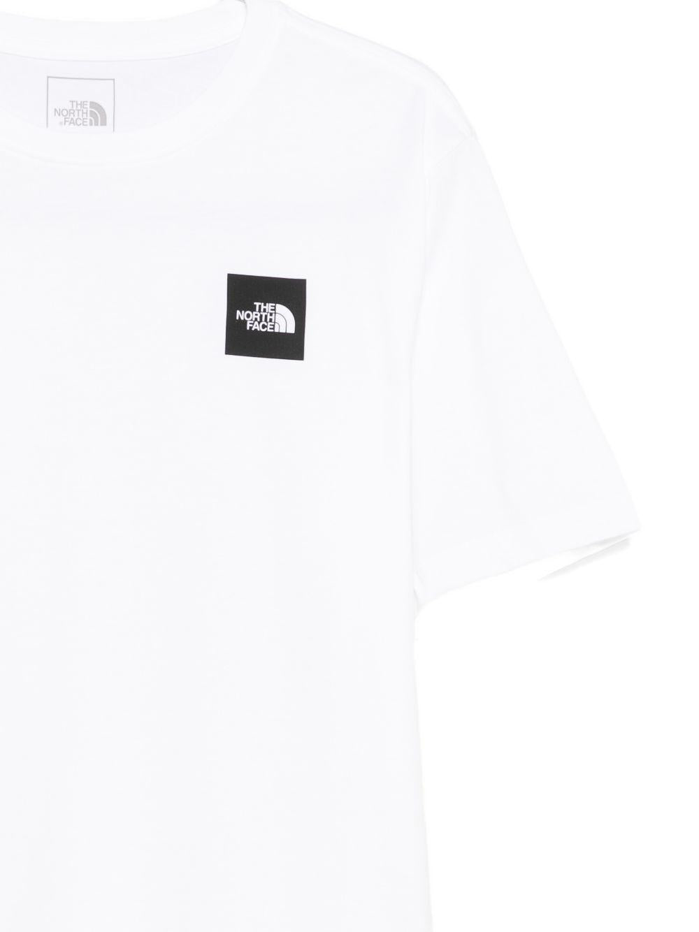 THE NORTH FACE T-shirt in cotone bianco con patch logo 