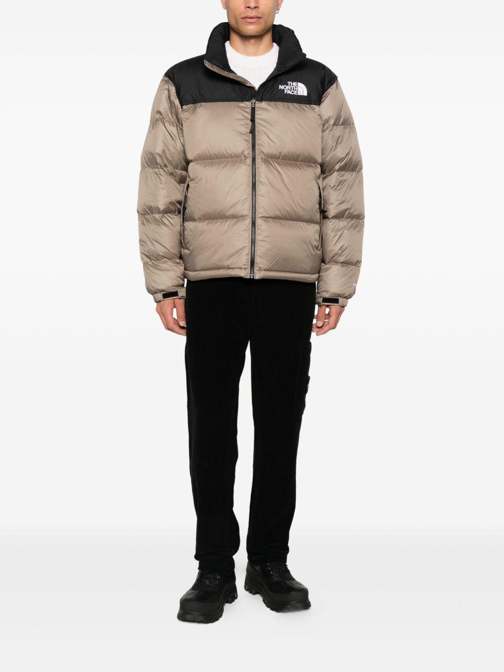 THE NORTH FACE Piumino corto beige e nero con logo 