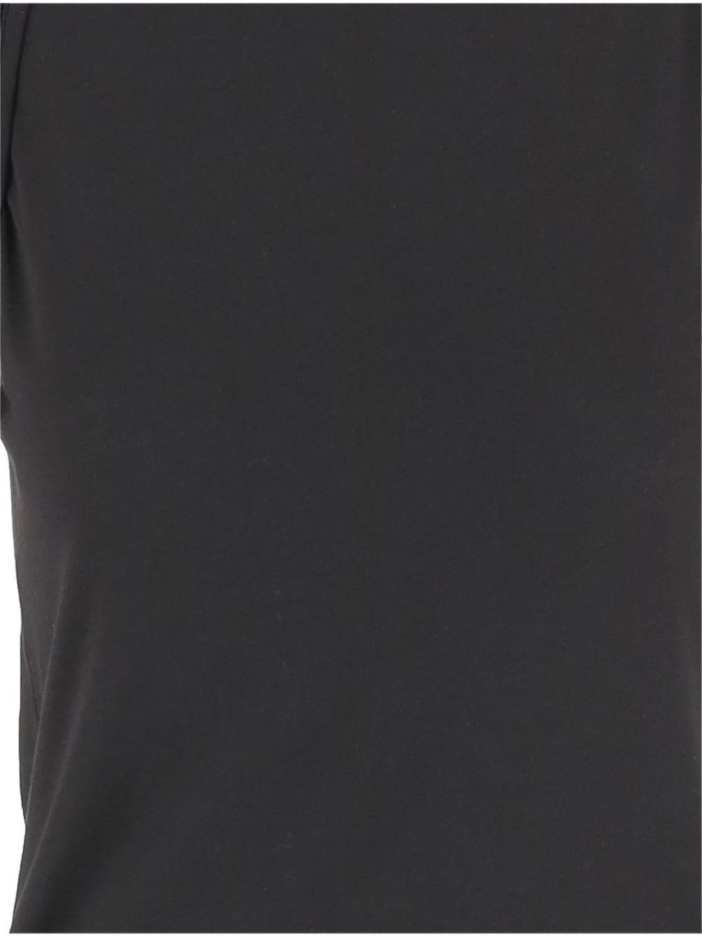 JACQUEMUS T-shirt in cotone nero con bottoncini 