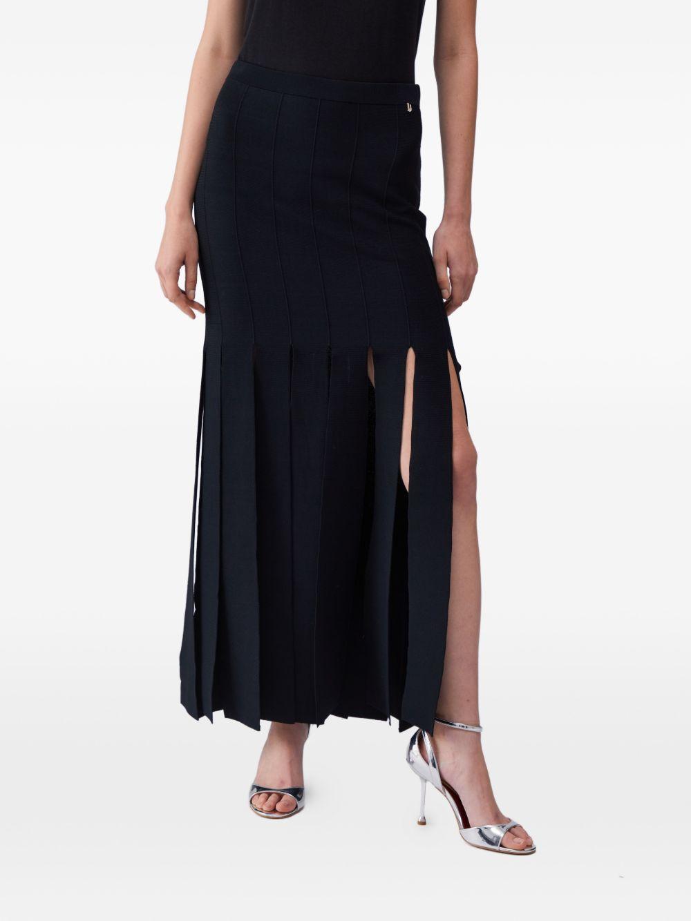 LIUJO Gonna lunga nera con taglio a frange 