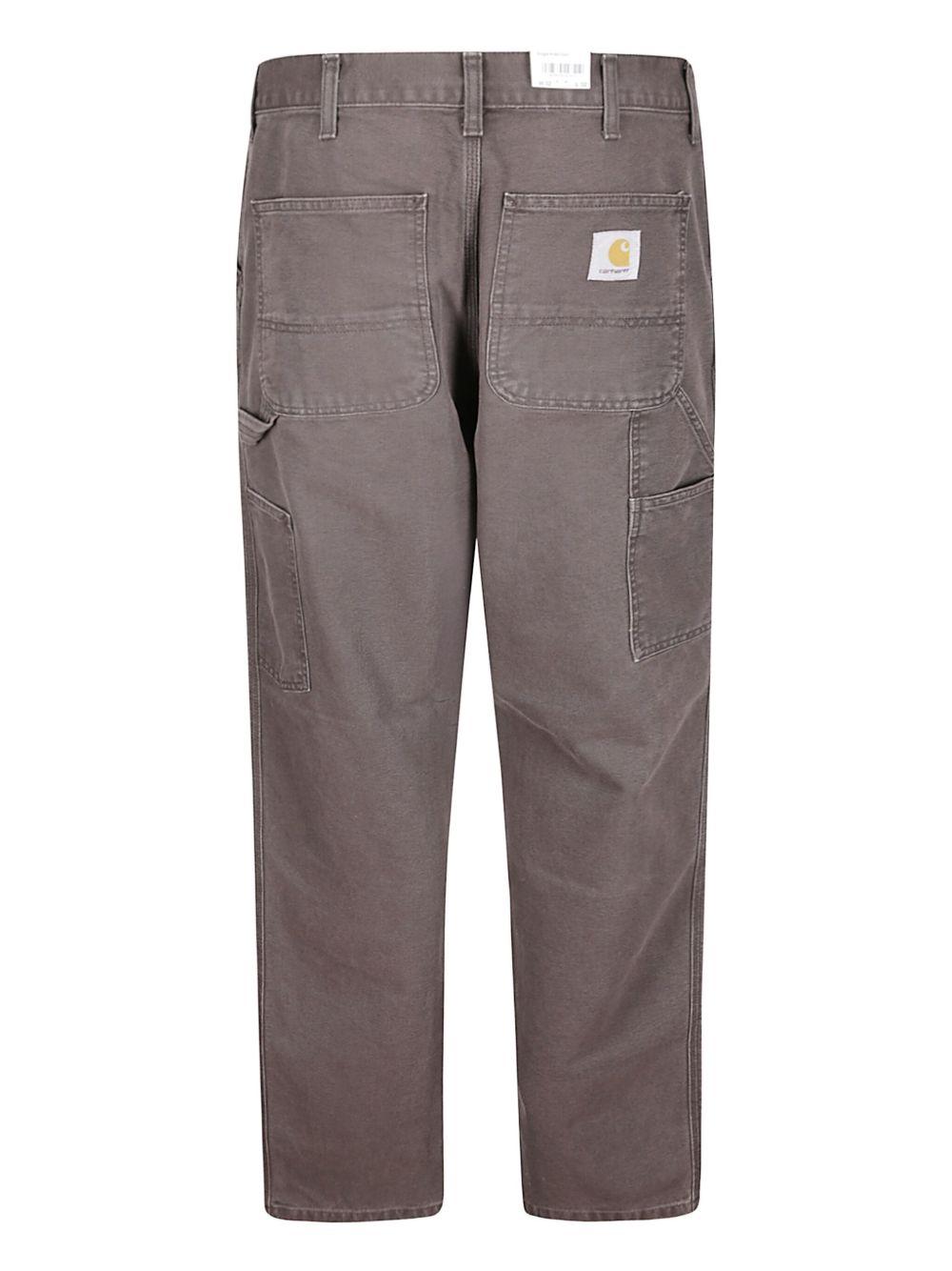 CARHARTT WIP Pantaloni grigi con applicazione logo 