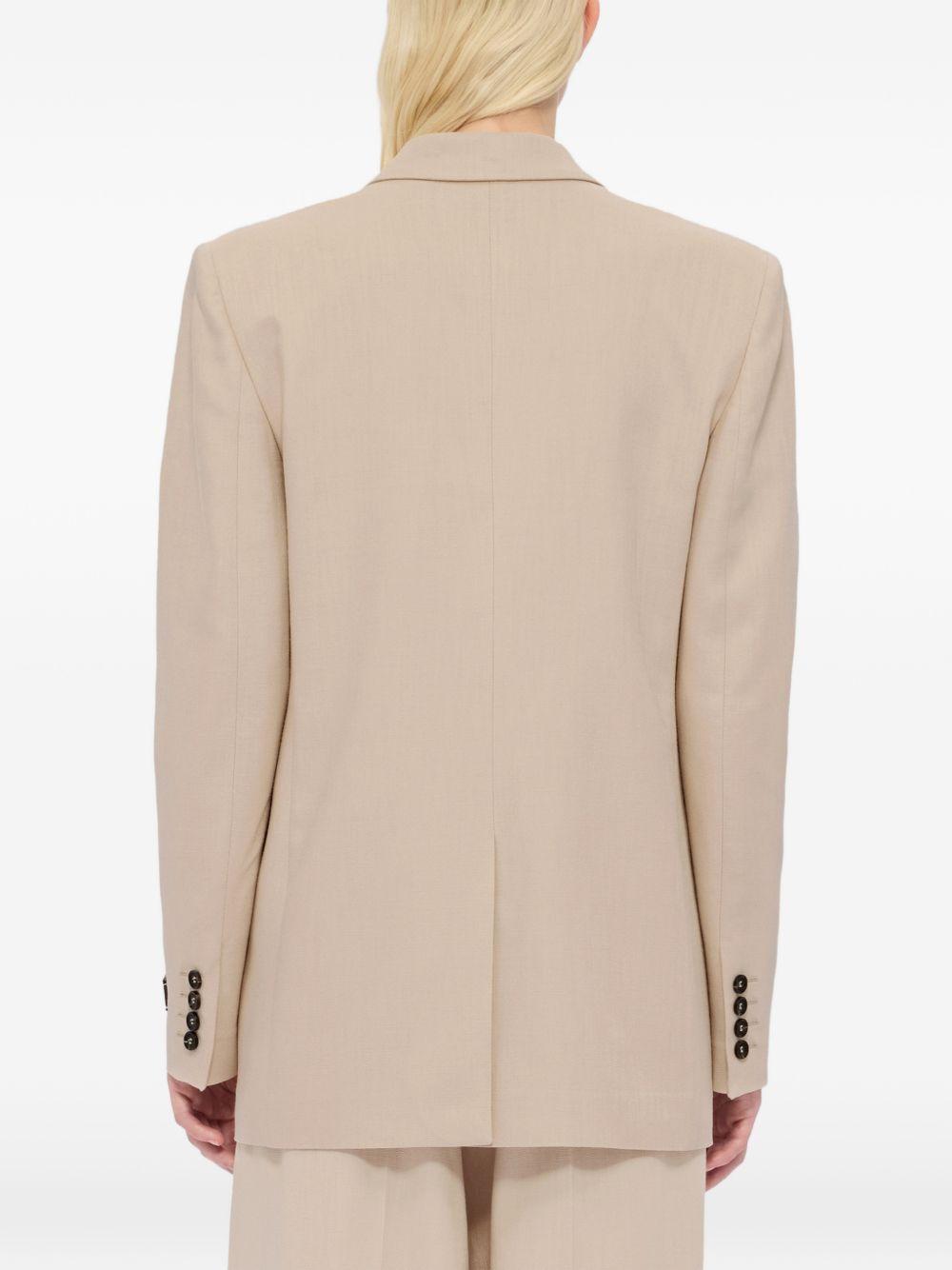 MSGM Blazer doppiopetto in beige con revers a lancia 