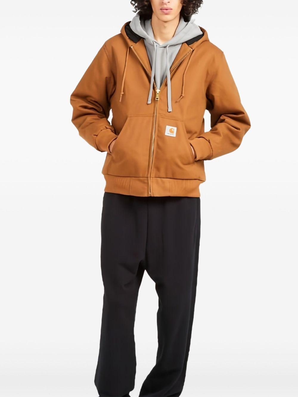 CARHARTT WIP Giubbotto marrone con cappuccio 