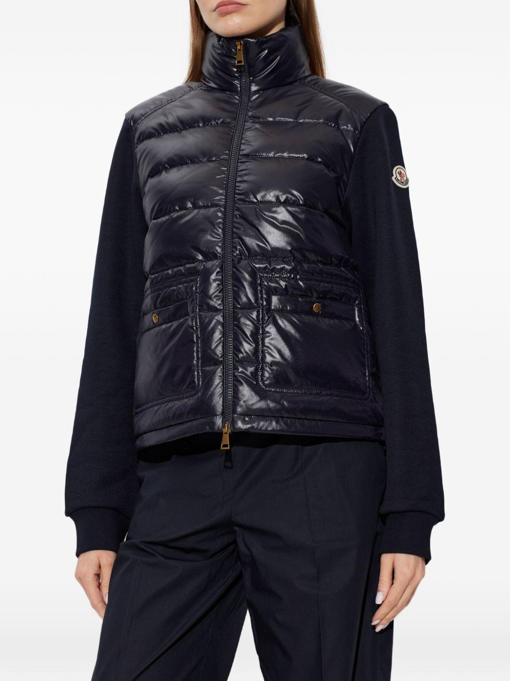 MONCLER Giacca piumino nero imbottito con tasche 