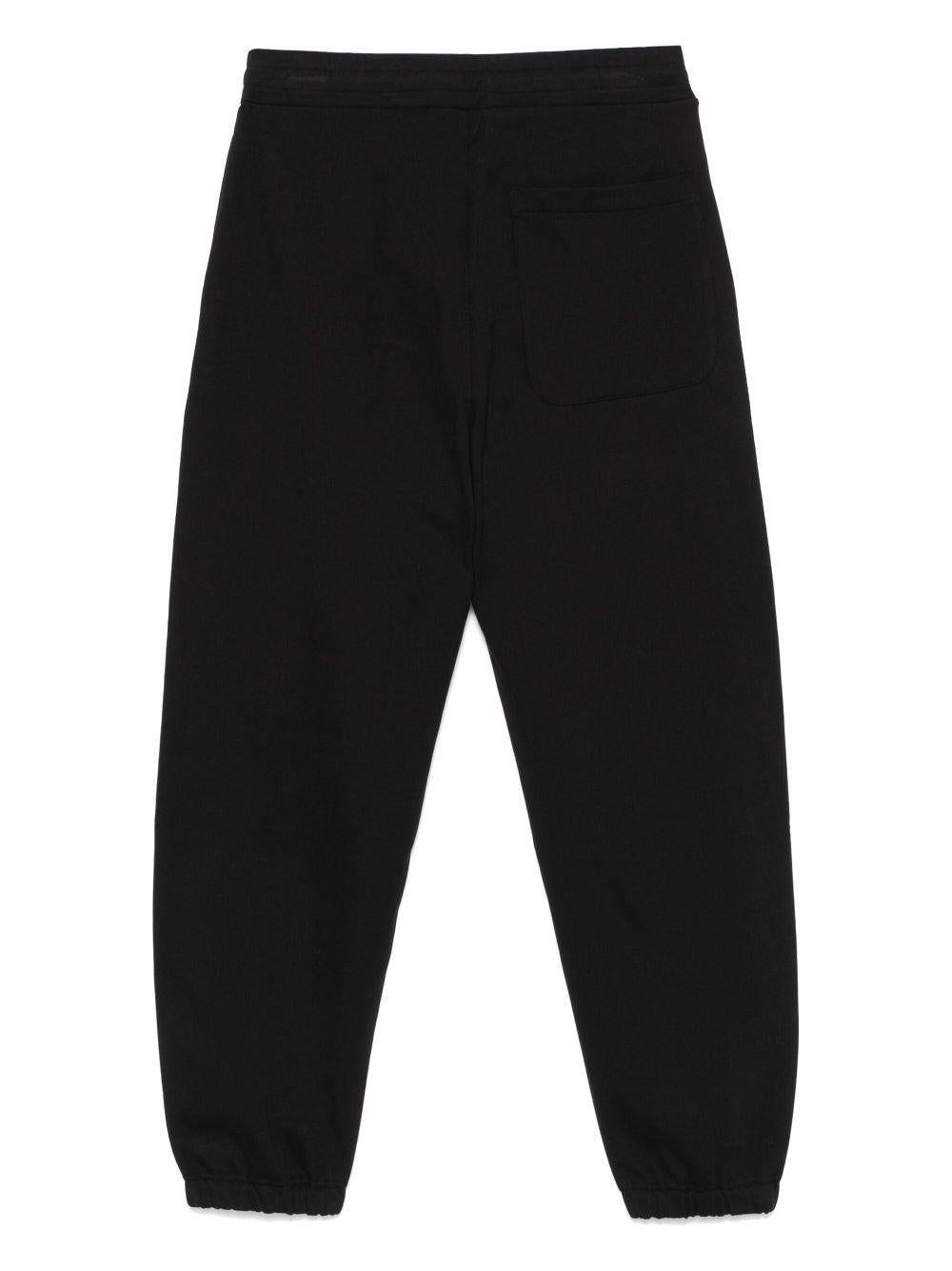 MSGM Pantaloni tuta in cotone nero con logo bianco 