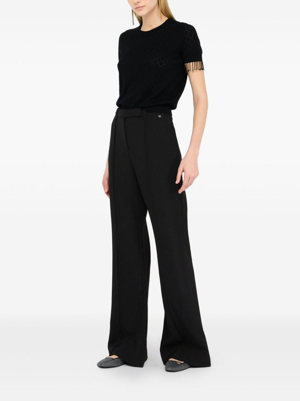 LIUJO Maglia nera con trama traforata e perline 