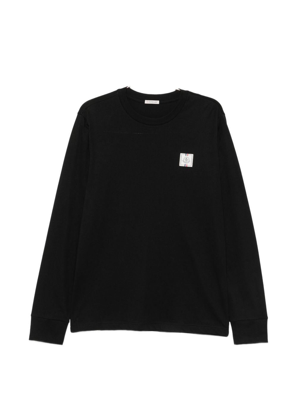 MONCLER Felpa nera in cotone con patch logo sul petto 