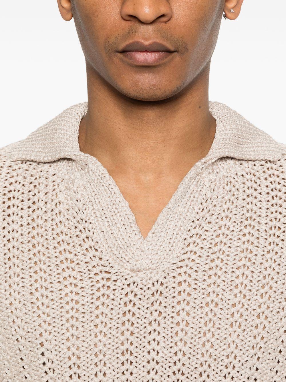 SCAGLIONE Maglia beige traforata con scollo a V 