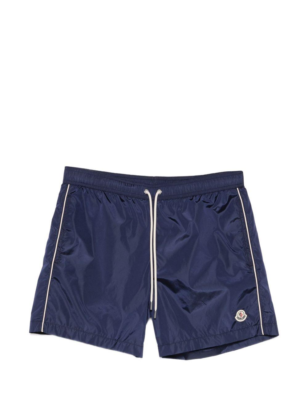 MONCLER Costume blu con logo 