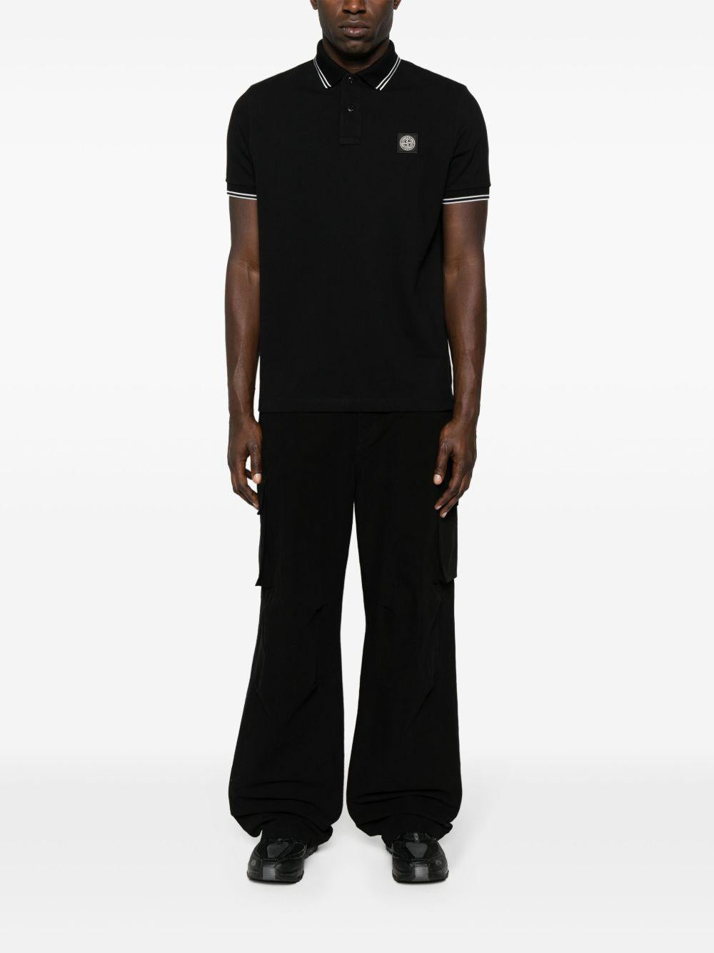 STONE ISLAND Polo in cotone nero con logo 