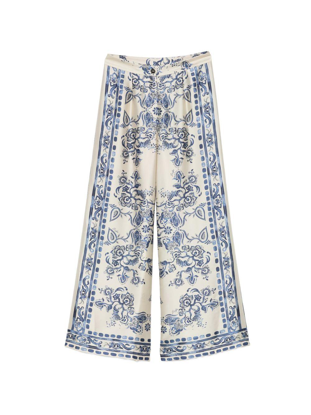 LIUJO Pantalone color crema con stampa floreale blu 